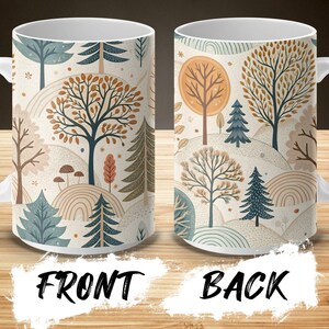 Peut inclure: Une tasse en céramique blanche avec un motif de scène de forêt colorée. L'avant présente un grand arbre orange avec des branches brunes et des feuilles vertes. L'arrière présente un arbre orange plus petit avec des branches brunes et des feuilles vertes. Les deux côtés présentent une variété d'arbres et de plantes dans des tons de vert, brun, orange et bleu.