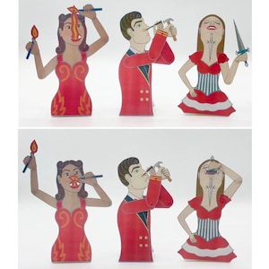 May include: A set of six whimsical paper cutouts depicting figures in red outfits. The figures include a woman holding a torch, a man with a hammer, and a woman with a sword. The figures are arranged in two rows of three.