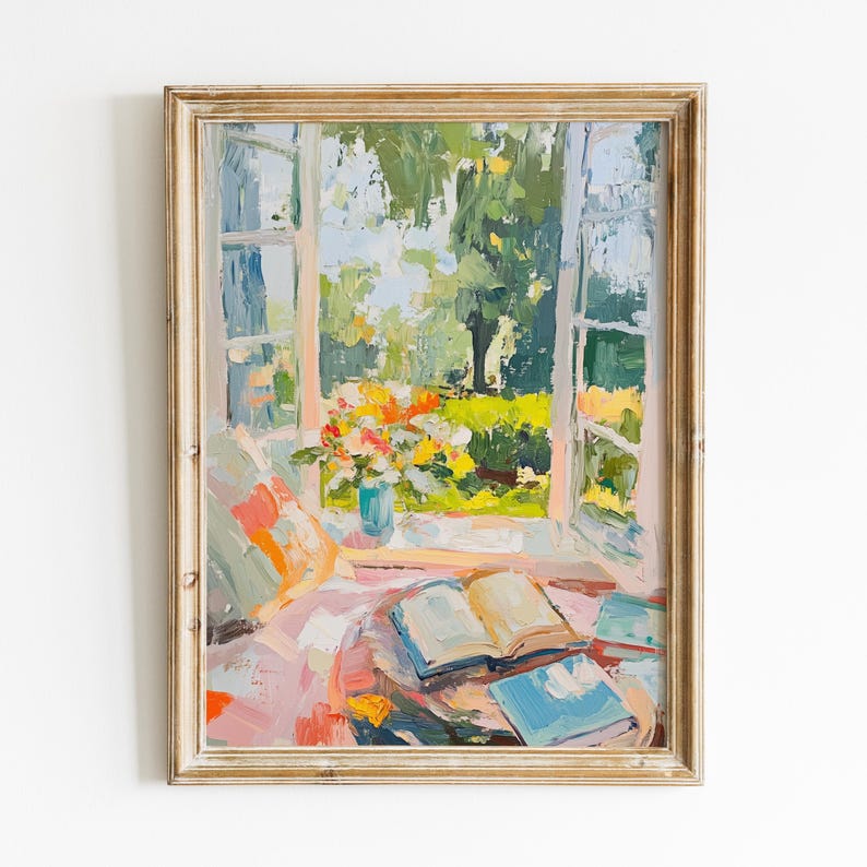 May include: A painting of a window with open curtains looking out onto a garden with a vase of flowers on a table with books. The painting is in a light wood frame.