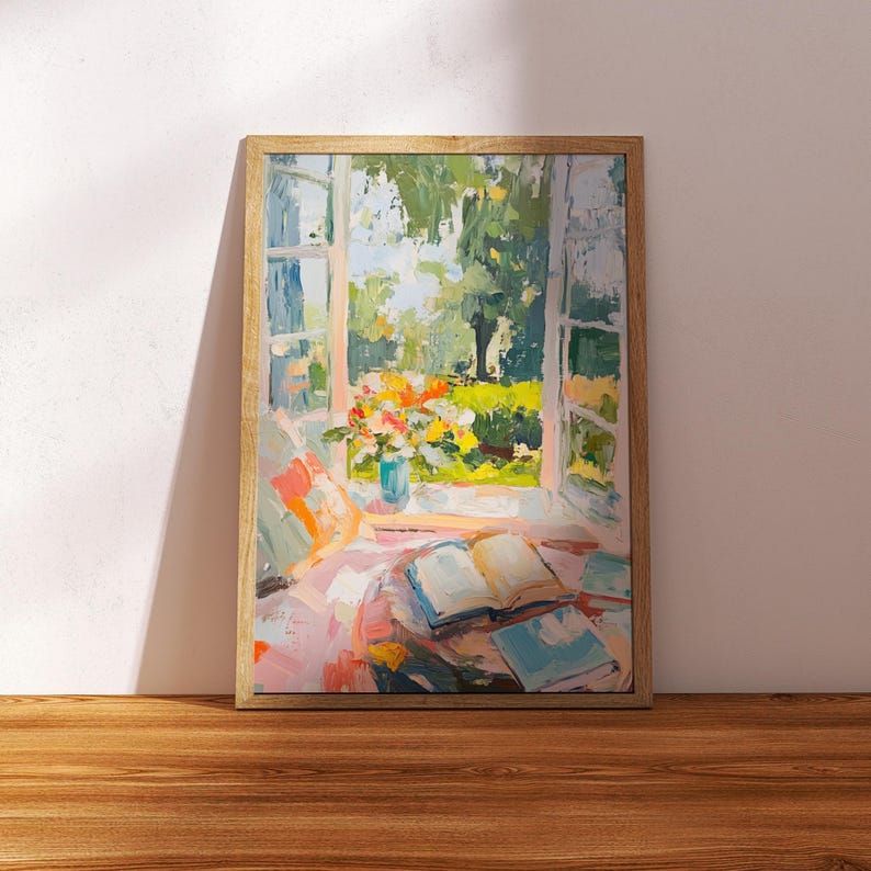 May include: A framed painting depicting a window with a view of a garden. The window is open and there are books and flowers on a table in the room. The painting is executed in a loose, impressionistic style with bright colours.