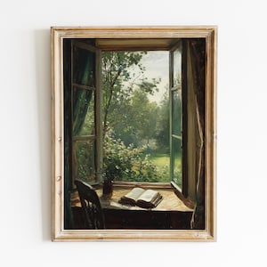 Pode incluir: Uma pintura de uma janela com vista para um jardim verdejante. A janela está aberta e há um livro sobre uma mesa ao lado da janela. A pintura é emoldurada em uma moldura de madeira clara.