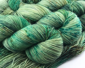 Hand Dyed Yarn “WOAH, NESSIE!” Green Brown Speckled Variegated Superwash Merino Deluxe Fingering Sock Yarn, Ready to Ship 100g 437 yards