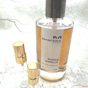 May include: A set of three ceramic mugs with a speckled, matte finish. The mugs are in shades of cream, light gray, and dark gray. Each mug has a simple, minimalist design, perfect for coffee or tea.