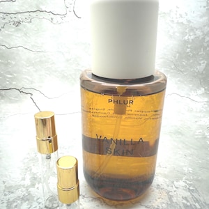 May include: A set of three ceramic mugs with a speckled, matte finish. The mugs are in shades of cream, light gray, and dark gray. Each mug has a simple, minimalist design, perfect for coffee or tea.