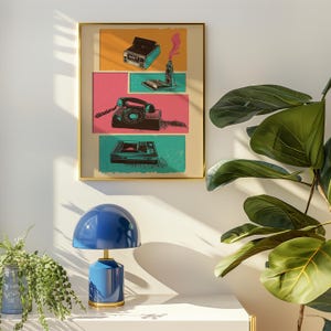 May include: A framed print with a retro aesthetic featuring a collage of vintage electronics, including a rotary phone, a cassette player, and a Polaroid camera. The print is set against a colorful background with a pink, blue, and green color scheme.