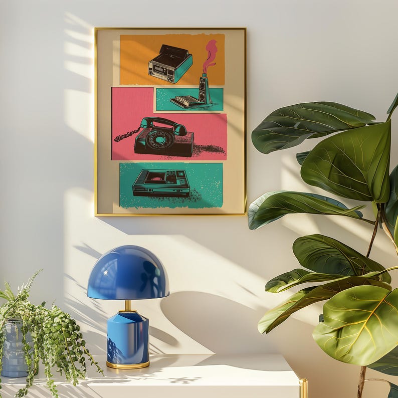 May include: A framed print with a retro aesthetic featuring a collage of vintage electronics, including a rotary phone, a cassette player, and a Polaroid camera. The print is set against a colorful background with a pink, blue, and green color scheme.
