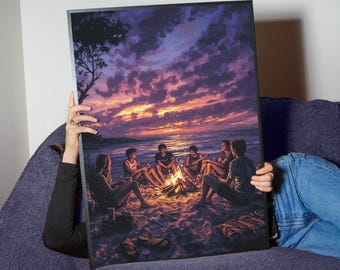 Pode incluir: Impressão artística emoldurada que retrata um grupo reunido em volta de uma fogueira na praia ao pôr do sol. A obra apresenta um céu vibrante com tons de roxo, laranja e amarelo, e uma moldura preta.