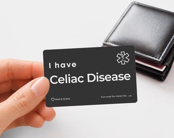 May include: A rectangular black medical alert card with white text that reads I have Celiac Disease. The card features a white Star of Life symbol in the top right corner, a small heart icon with the text Med & Grace, and Turn over for more info.