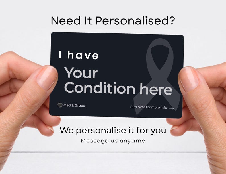 May include: A rectangular black medical alert card featuring the white text I have Your Condition here, a grey awareness ribbon graphic, the Med & Grace logo, and the instruction Turn over for more info with an arrow pointing to the right.