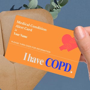 May include: Orange medical alert card with a red heart and hands, and the text "Medical Condition Alert Card", "Your Name", "PLEASE TURN OVER FOR INFORMATION", and "I have COPD."