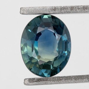 Natural Oval Parti Sapphire 0.74ct: Stunning Ceylon Gemstone with Blue and Yellow Hues - Unique Natural Beauty and Elegance!