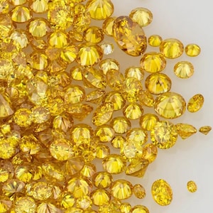 Natural Fancy Vivid Canary Yellow Diamond: Untreated Round Cut Accent Stone