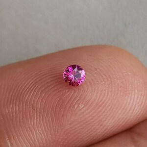 Vivid Pinkish Red Mozambique Ruby Round, 3.0mm Diamond Cut, Natural, 0.14ct – Exquisite Gemstone with Stunning Clarity and Color.