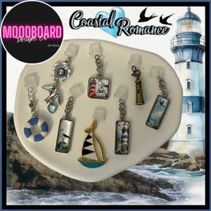 May include: A collection of eight coastal-themed charms featuring a blue and white life preserver, a silver flower with a bird, a square lighthouse graphic, a bronze lighthouse, a sailboat, and three rectangular charms with nautical imagery.