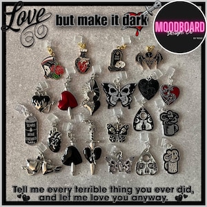 May include: A collection of gothic-themed charms with various designs, including butterflies, hearts, and skulls. The charms are in black, silver, and red, with the text "Love but make it dark" and "Tell me every terrible thing you ever did, and let me love you anyway."