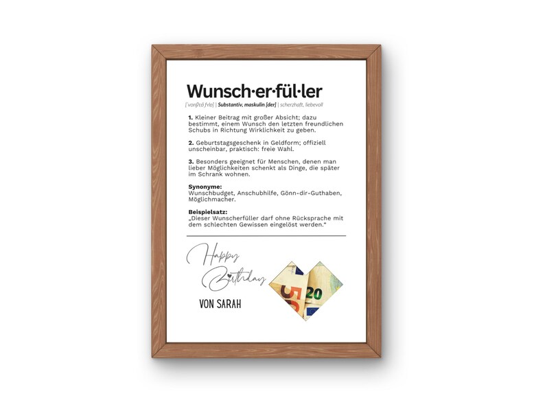 May include: A framed print with a wooden frame. The print features German text, including the word "Wunscherf&uuml;ller" and a definition. Below the text is "Happy Birthday" and "VON SARAH". A folded paper with the number 20 is in the lower right corner.