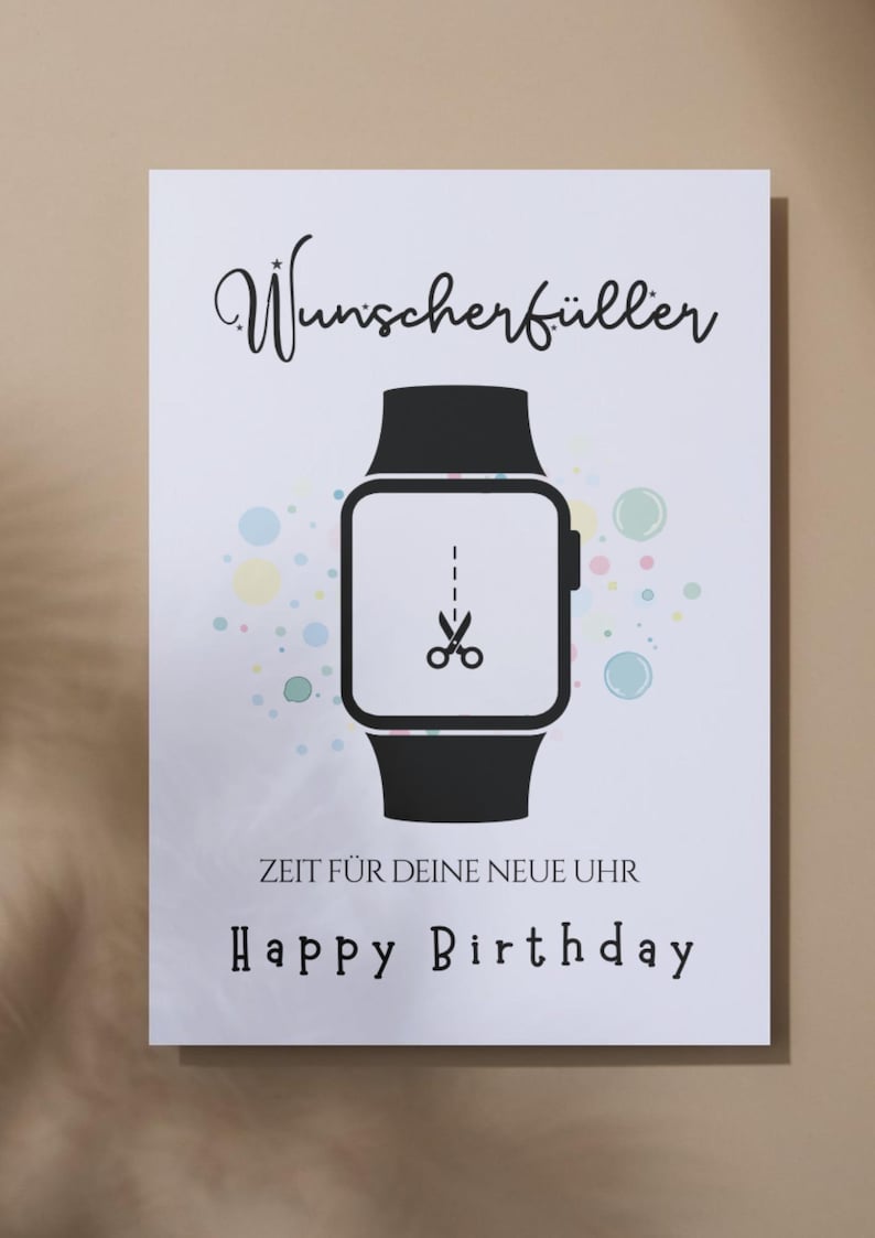 May include: A white rectangular greeting card featuring a black smartwatch illustration with a scissor icon on the screen. The text reads Wunscherf&uuml;ller, ZEIT F&Uuml;R DEINE NEUE UHR, and Happy Birthday, surrounded by small pastel-colored circles.