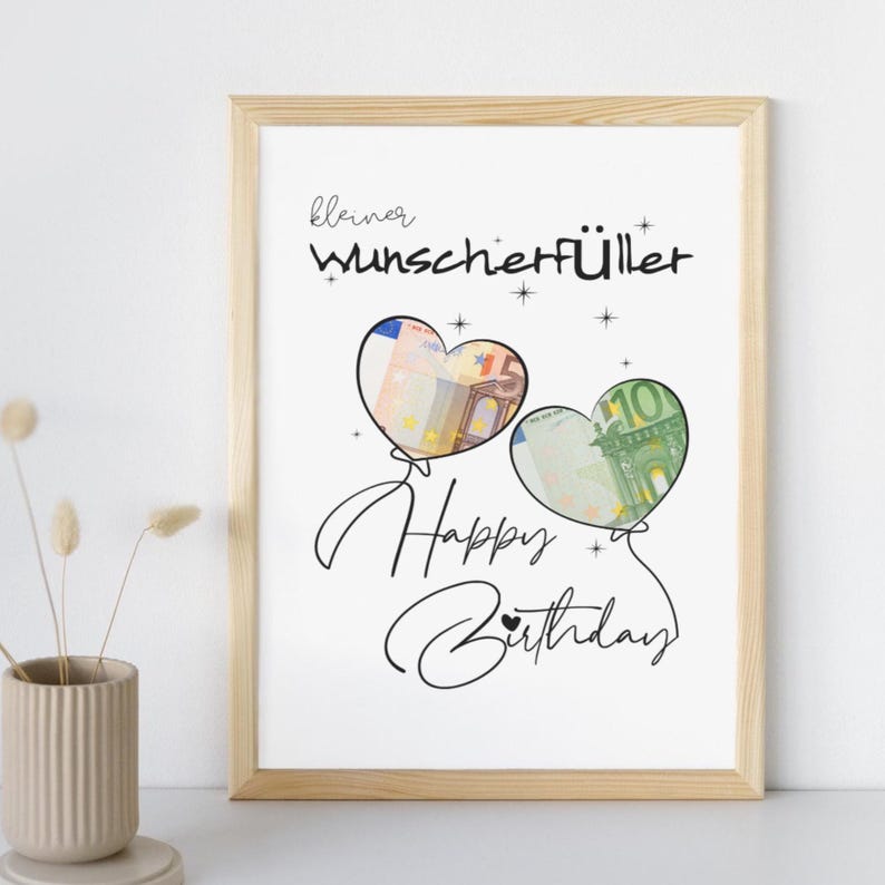 K&ouml;nnte beinhalten: Ein gerahmter Druck mit dem Text "kleiner Wunscherf&uuml;ller" und "Happy Birthday" in schwarzer Schrift. Zwei herzf&ouml;rmige Ballonumrisse enthalten Bilder von Euro-Banknoten. Das Design umfasst kleine Sternakzente auf einem wei&szlig;en Hintergrund.