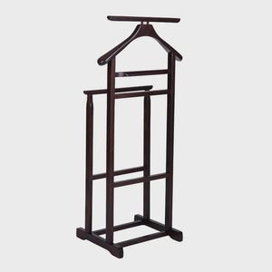 May include: A dark brown wooden valet stand featuring a top hanger for jackets, a horizontal bar for trousers, and a lower support frame. The structure is composed of vertical posts and horizontal crossbars, providing a freestanding organizer.