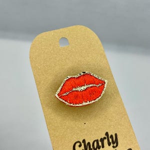 Kiss Brooch