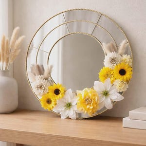 Mirror, with yellow and white flowers and bling.