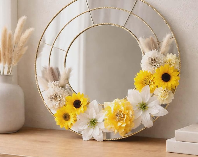 Mirror, with yellow and white flowers and bling.