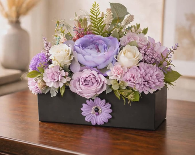 Small purple flower explosion in black box with bling. Dragonfly on flowers.