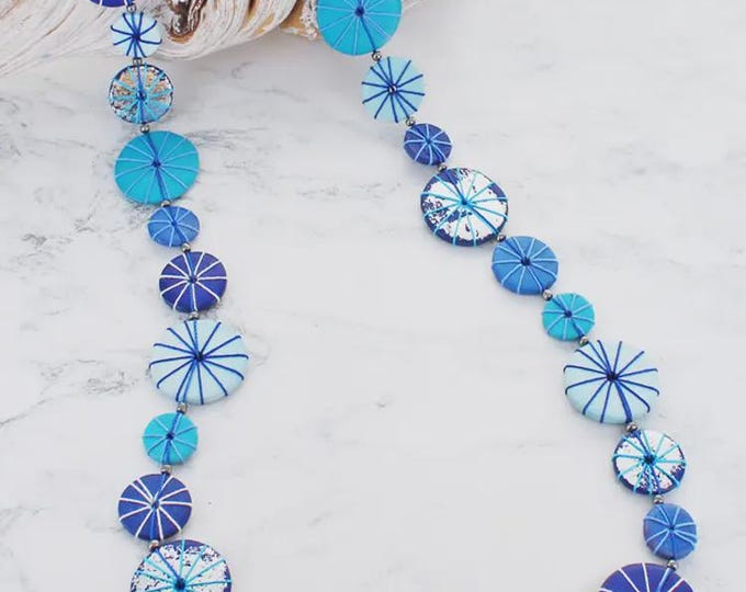 Long wooden disc and thread necklace