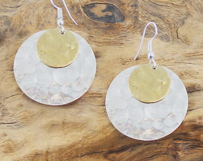 Mixed metal triple ring earrings.