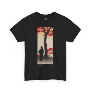 May include: Black t-shirt with a graphic print of a Japanese woodblock print depicting a person standing in front of a red-leafed tree. The text "Utagawa Hiroshige" and "Autumn Colors" is printed below the image.