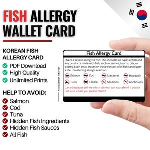 May include: A white wallet card with the text "Fish Allergy Card" held in a hand. The card lists types of fish to avoid, including salmon, cod, and tuna. The card also states that it is a Korean fish allergy card.