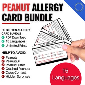 May include: A peanut allergy card bundle with the text "Peanut Allergy Card Bundle" in red and black. The card includes information in 15 languages, with a list of items to avoid, such as peanuts and peanut oil. The card is held by a person.