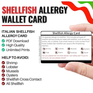 May include: A white wallet card with the text "Shellfish Allergy Card" held by a hand. The card lists shellfish to avoid, including shrimp, lobster, mussels, and oysters. The card also states the user is severely allergic to shellfish.