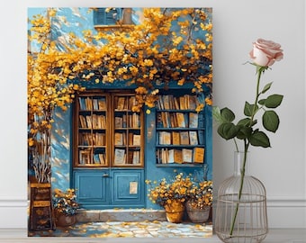 May include: A canvas print of a quaint bookstore facade. The blue door and window frames are adorned with golden-yellow flowers. Bookshelves are filled with books. A rose in a glass vase is on the right.
