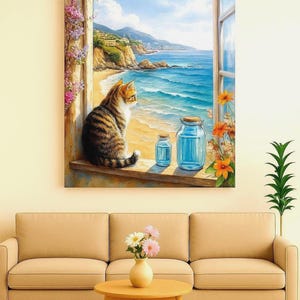 May include: A canvas print showing a tabby cat looking out of a window at a coastal scene. The artwork features a beach, ocean, and mountains under a blue sky. Two glass jars with blue liquid sit on the windowsill, with flowers.