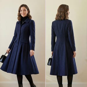 May include: A navy blue long-sleeved coat featuring a structured collar, a button-down front, and a flared skirt silhouette that reaches below the knees. The coat includes two flap pockets at the waist and is shown from both front and back views.