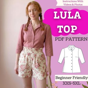 May include: A PDF pattern for the Lula Top, featuring a button-down shirt with three-quarter sleeves. The image displays a mauve shirt, floral shorts, a technical line drawing of the top, and text including Instructions With Videos & Photos.