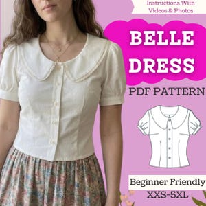 May include: A white, short-sleeved blouse with a Peter Pan collar and button-down front. The collar is trimmed with lace. The image includes the text "BELLE DRESS PDF PATTERN" and "Beginner Friendly XXS-5XL".