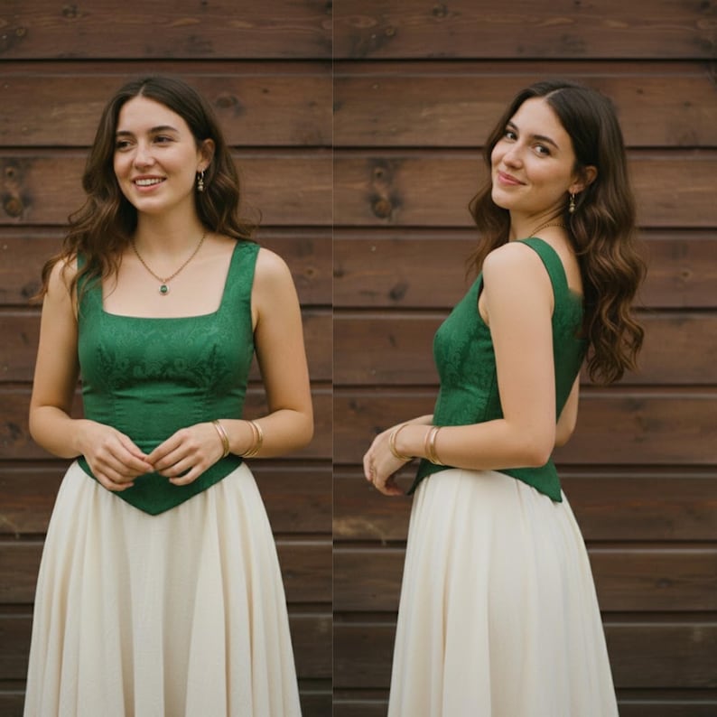 May include: A sleeveless bodice in a deep emerald green fabric with a subtle tonal pattern, featuring a square neckline and a pointed hemline, paired with a long, flowing, off-white skirt that reaches below the knees in a simple, elegant design.