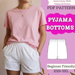 May include: A person wearing a pink t-shirt and white pajama shorts with a pink heart pattern. The image includes a diagram of pajama bottoms and text that reads "PDF PATTERN" and "PYJAMA BOTTOMS". The pattern is "Beginner Friendly" and available in sizes XXS-5XL.