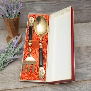 Vintage Cutlery, serving set, Spoon & Fork in Bronze and Tropical Hardwood with ornate Eastern Deity design, circa mid century.