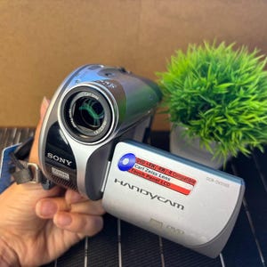 Working, digital video camera, Sony Handycam DCR-DVD105E, Mini DVD, ready to use, cool, retro, top, made in Japan, lens Carl zeiss
