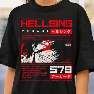 May include: A black t-shirt featuring a red and white graphic print with the text HELLSING, the quote THE BIRD OF HERMES IS MY NAME, EATING MY WINGS TO MAKE ME TAME, and RESIGNATION IS WHAT KILLS PEOPLE. Includes Japanese characters and a stylized face.