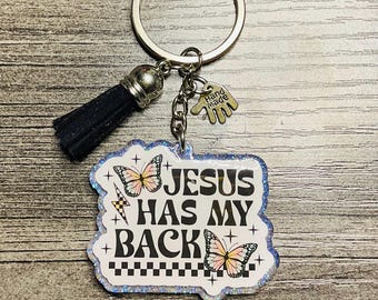 Llavero de Jesús con purpurina holográfica: accesorio para la fe cristiana