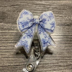 Blue Floral Bow Badge Reel: Glitter Retractable ID Holder