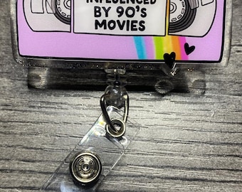 Heavily Influenced By 90’s Movies Badge Reel – Retro Rainbow Cassette Design