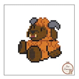May include: Pixelated illustration of a brown Ewok-like creature with orange fur, gray horns, and a small pink mouth. The image is a cross-stitch design, with a Sew Demicious logo in the bottom right corner.