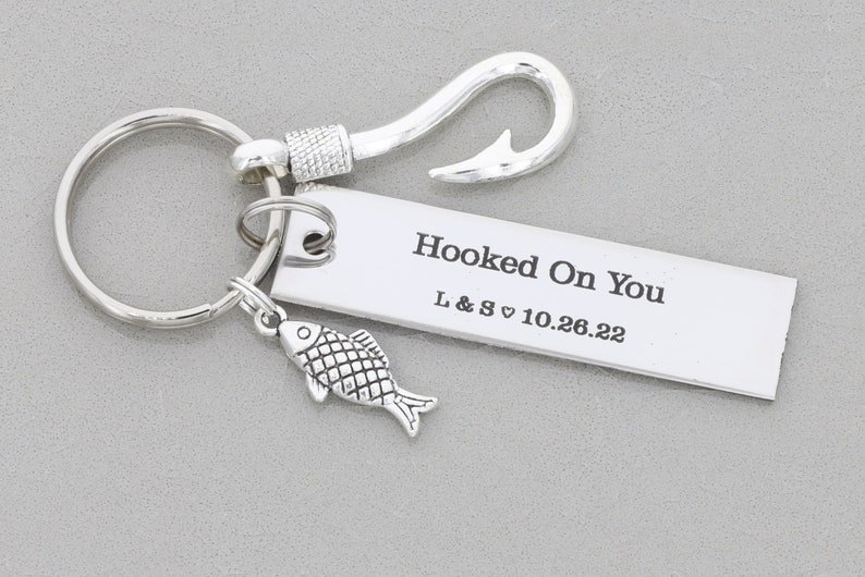 Keychain with a silver-plated rectangular engraved your own message, silver-plated fishing hook, silver-plated fish