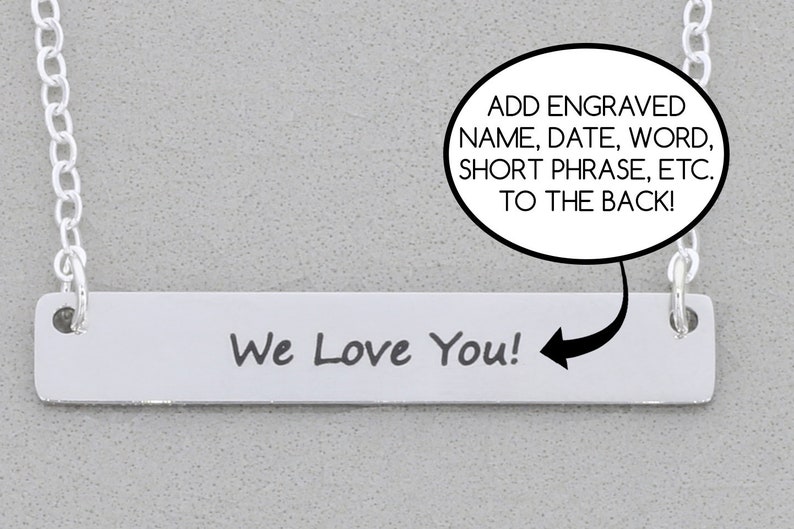 A silver rectangular pendant on a chain displays the engraved word "We Love You!" in black script. An arrow points to back, suggesting customizations: "Add engraved name, date, word, short phrase, etc. to the back!";