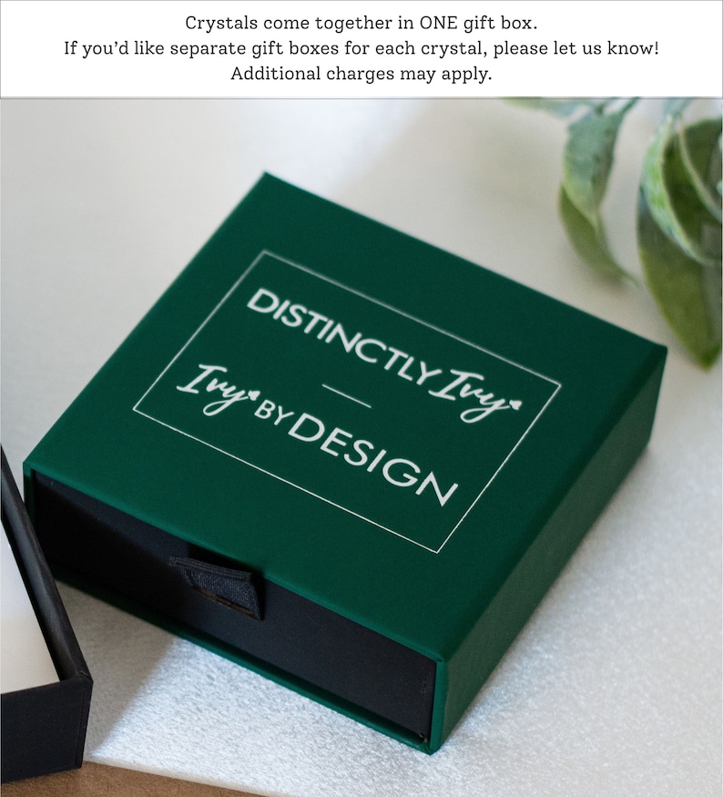 DistinctlyIvy green drawer gift box on white fabric with green leaves in the background